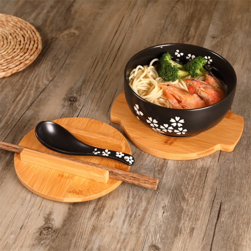 pottery bowls with lids, spoons and chopsticks, rice bowls of noodles and rice, soups, salads, tableware and food containers.