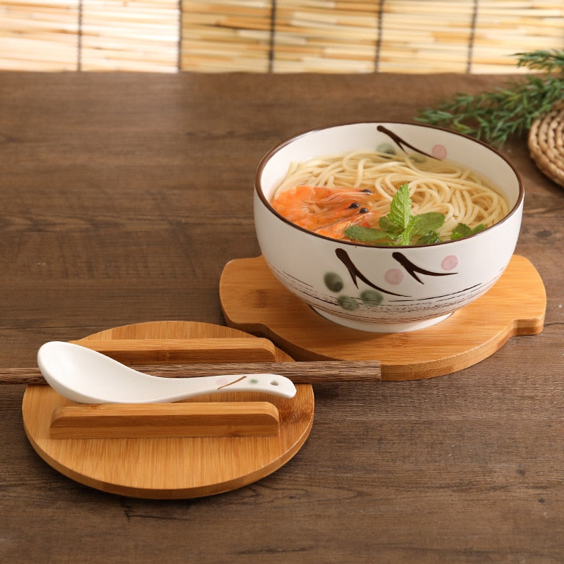 pottery bowls with lids, spoons and chopsticks, rice bowls of noodles and rice, soups, salads, tableware and food containers.